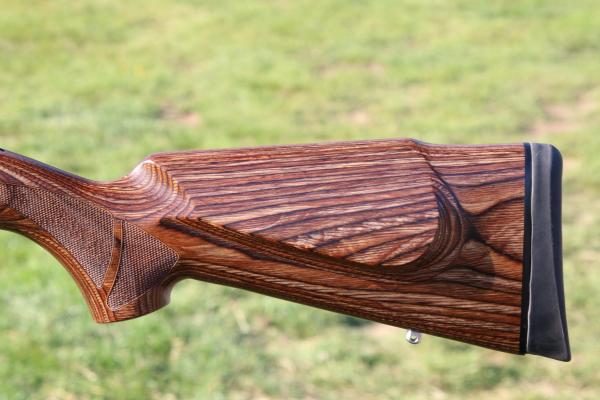 SAKO .223 85 STAINLESS LAMINATE FLUTED VARMINT, GOOD BORE!
