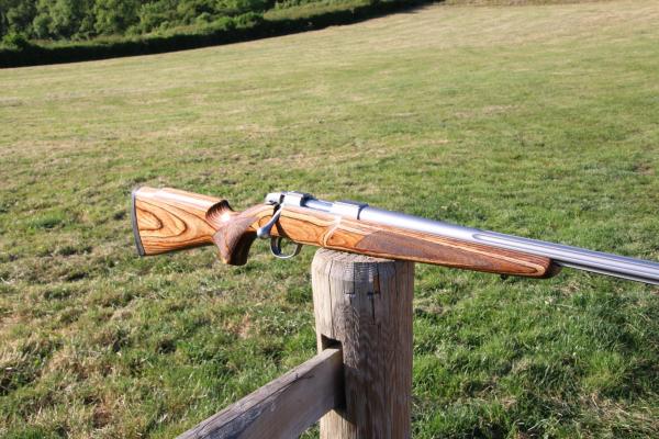 SAKO .223 85 STAINLESS LAMINATE FLUTED VARMINT, GOOD BORE!